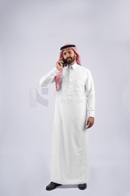 Gulf man talking on the phone