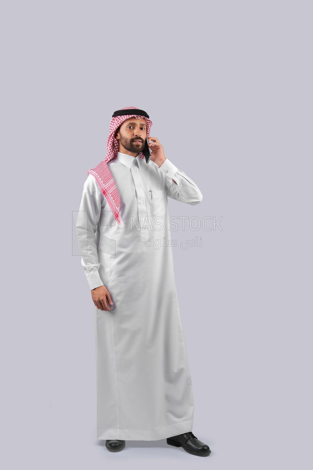 Gulf man talking on the phone