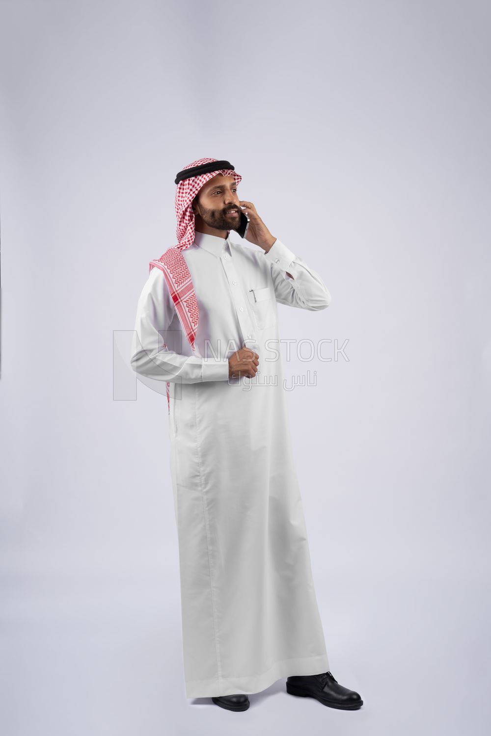 Gulf man talking on the phone