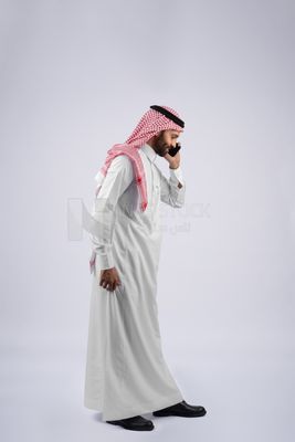 Gulf man talking on the phone