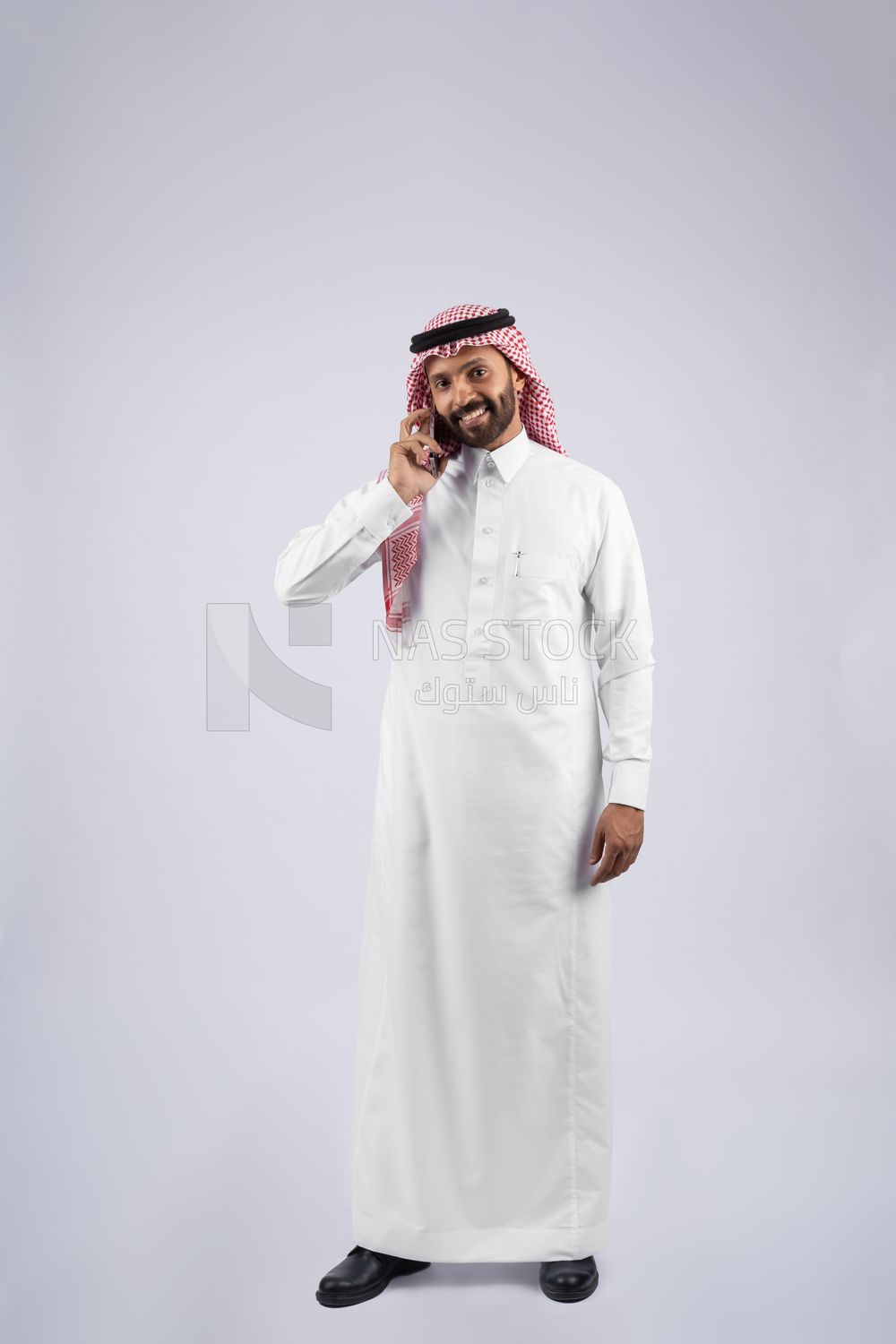 Gulf man talking on the phone