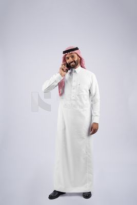 Gulf man talking on the phone