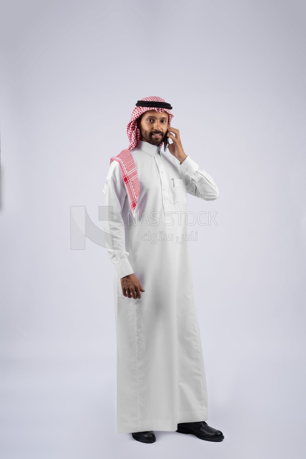 Gulf man talking on the phone