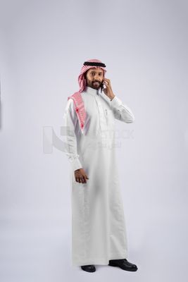 Gulf man talking on the phone