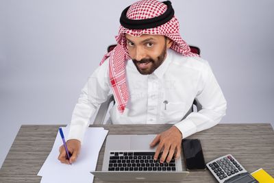 Gulf man working in company