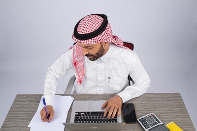 Gulf man working in company