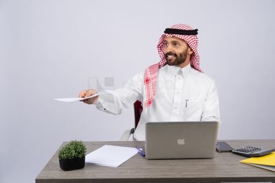 Gulf man working in company