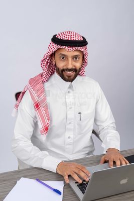 Gulf man sitting at desk