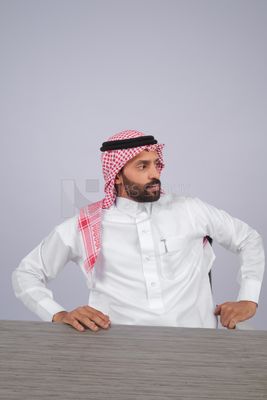Gulf man sitting at desk