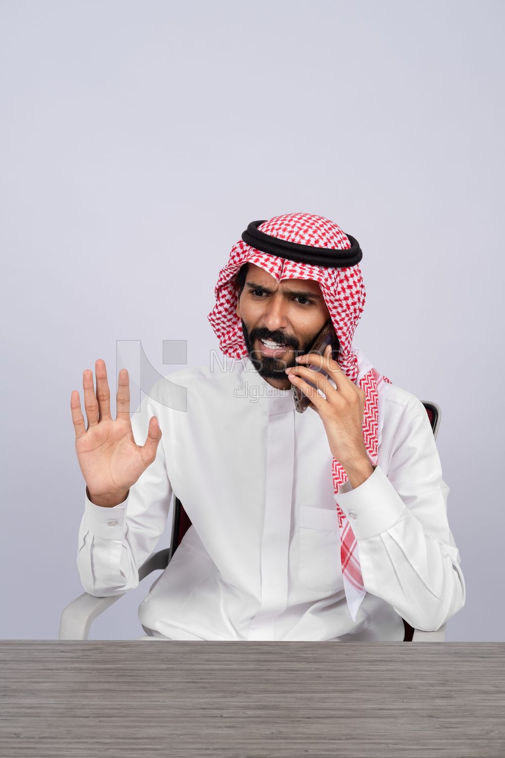 Gulf man talking on the phone