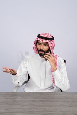 Gulf man talking on the phone