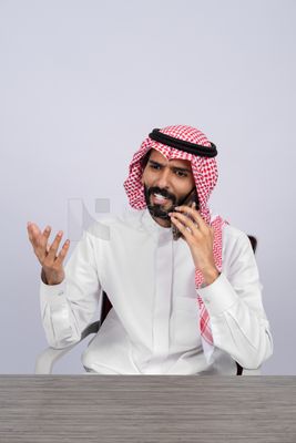 Gulf man talking on the phone