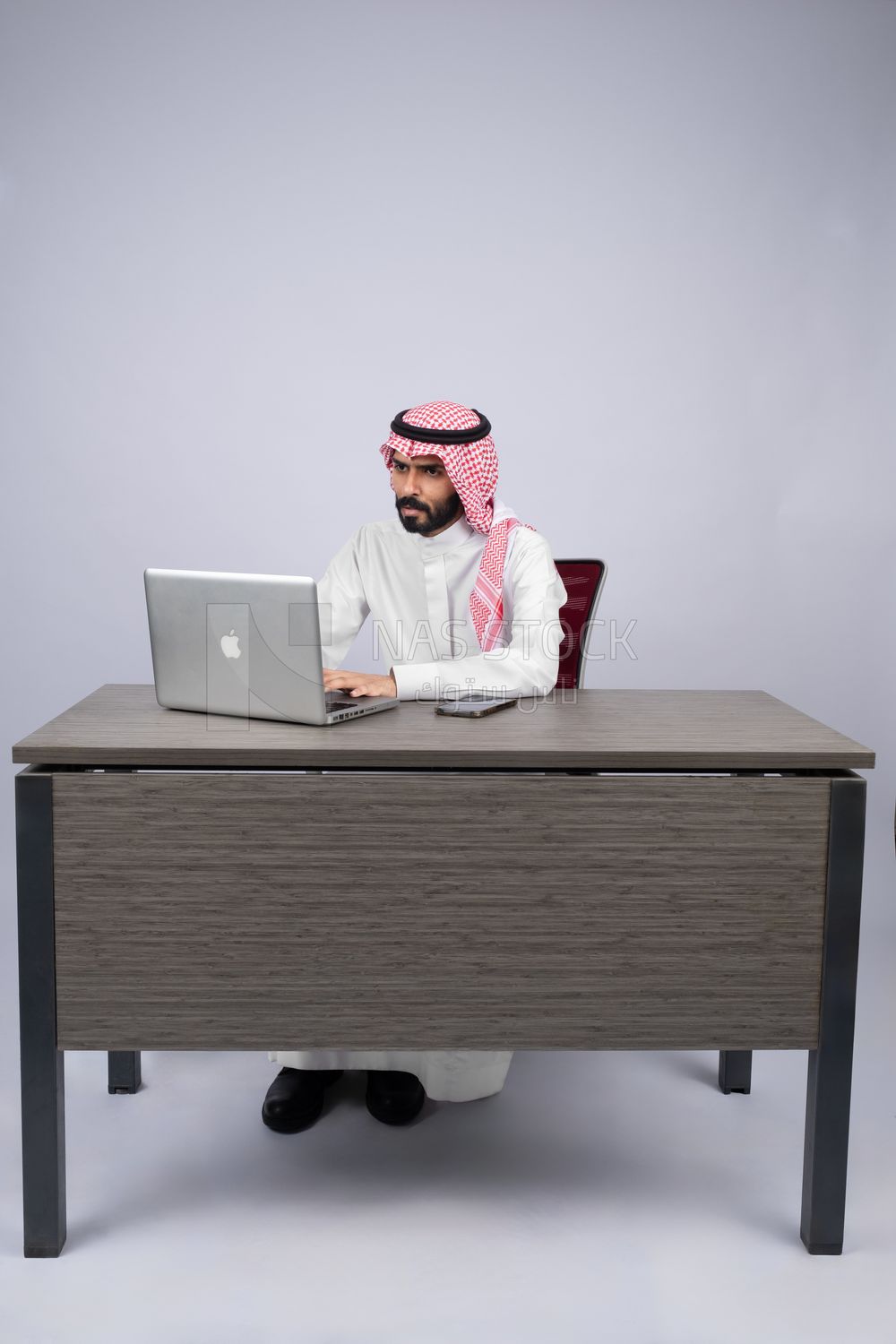 Gulf man busy with his work