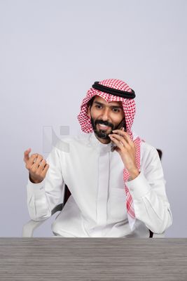 Gulf man talking on the phone