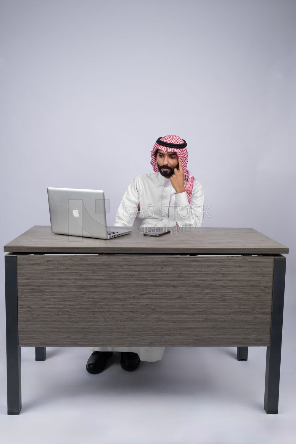 Gulf man busy with his work