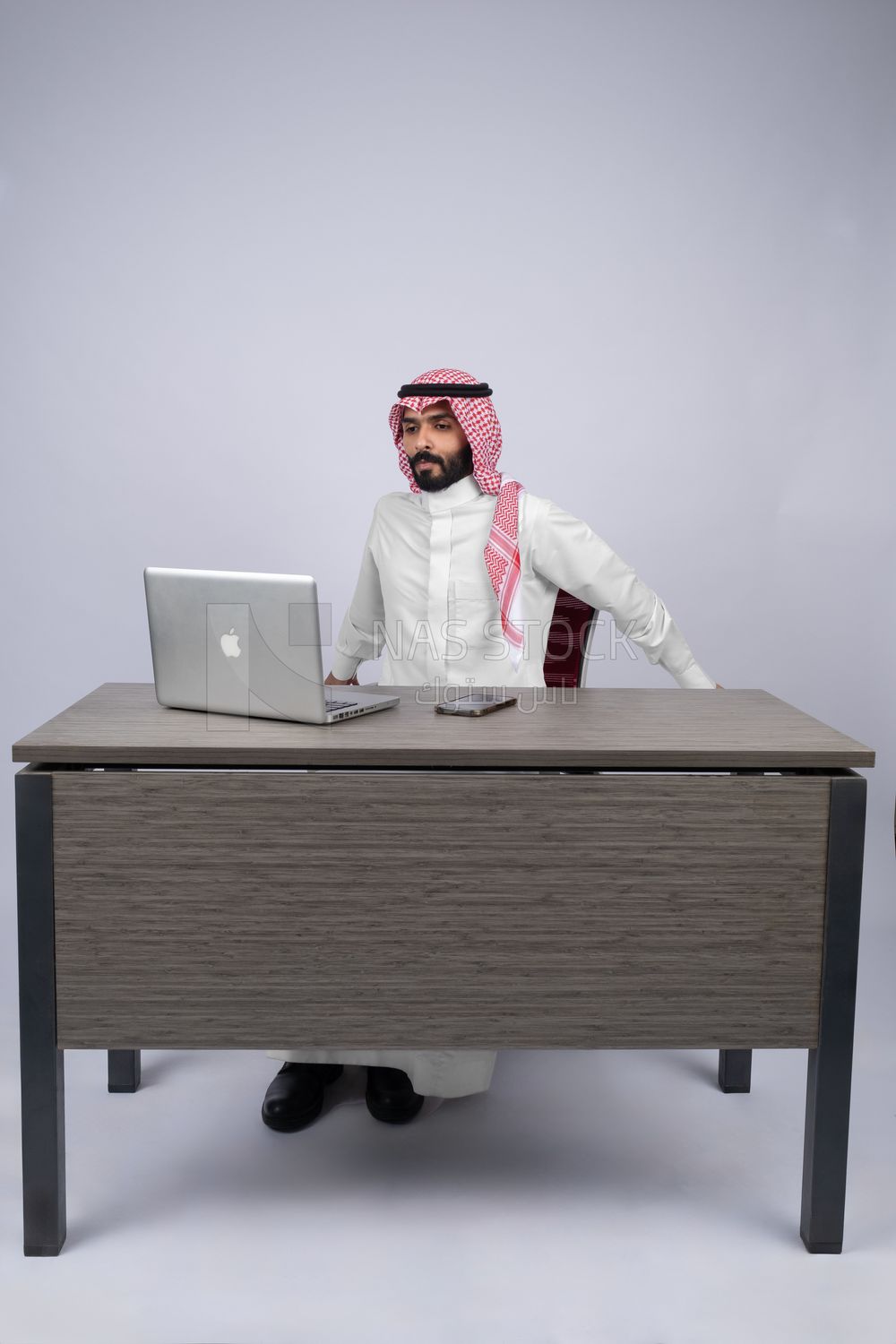 Gulf man busy with his work