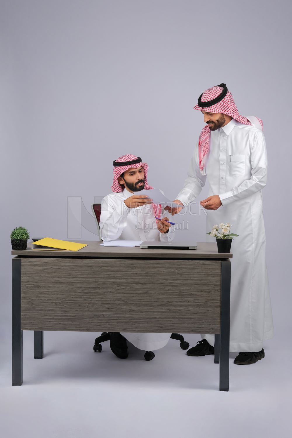 Two Gulf men at work