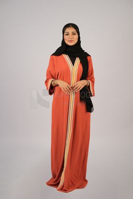 Saudi girl wearing Gulf abaya