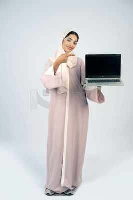 Gulf girl holding laptop