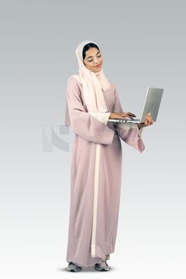 Gulf girl holding laptop