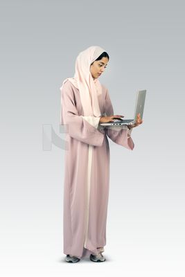 Gulf girl holding laptop