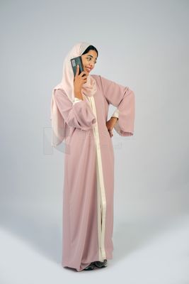 Gulf girl talking on phone