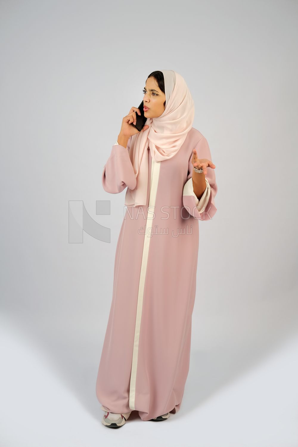 Gulf girl talking on phone