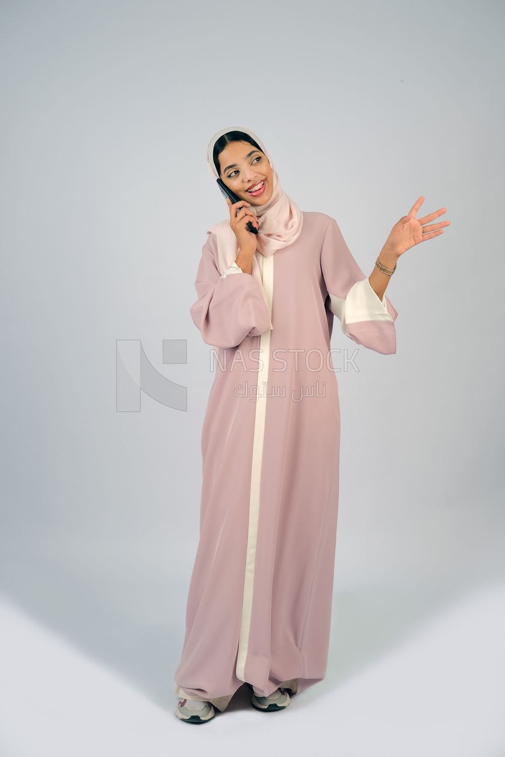 Gulf girl talking on phone