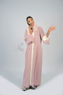 Gulf girl talking on phone