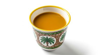 A traditional Arabic coffee cup It is filled with Arabic coffee