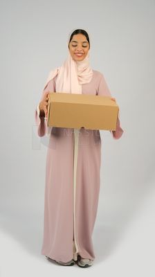 Gulf girl carrying order shipping box