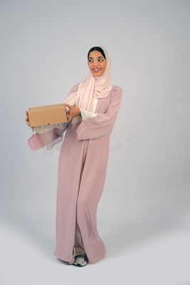 Gulf girl carrying order shipping box