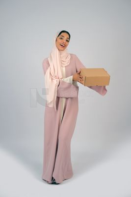 Gulf girl carrying order shipping box