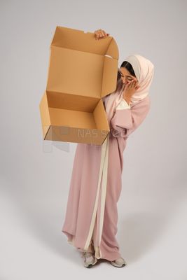 Gulf girl carrying order shipping box