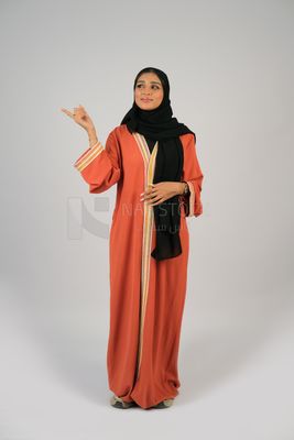 Gulf girl in colorful abaya and black hijab