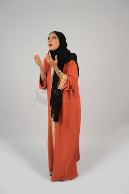 Gulf girl raising her hand up