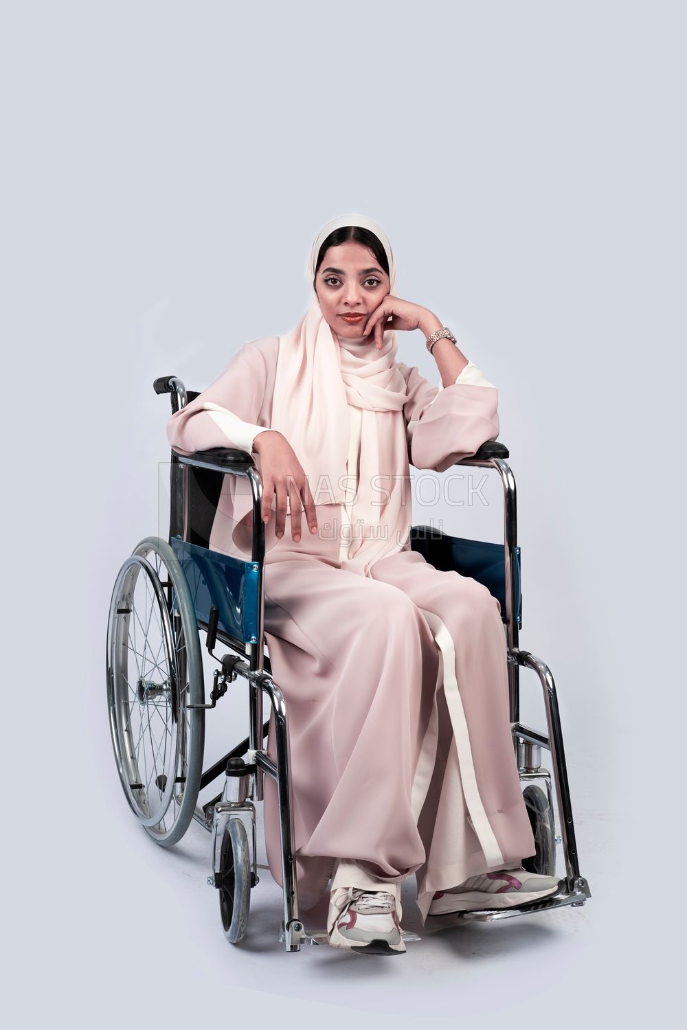 Girl sitting in wheelchair