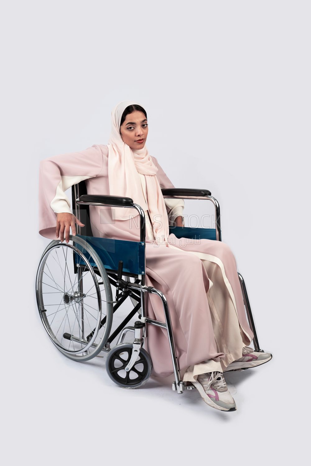 Girl sitting in wheelchair