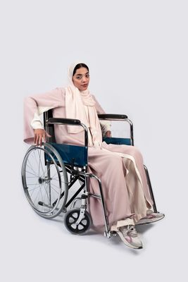Girl sitting in wheelchair