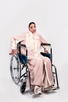 Girl sitting in wheelchair