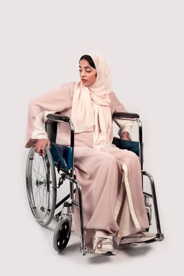 Girl sitting in wheelchair