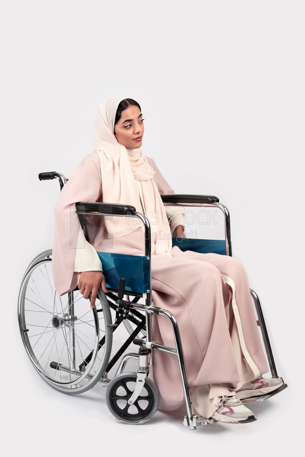 Girl sitting in wheelchair