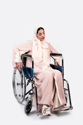 Girl sitting in wheelchair