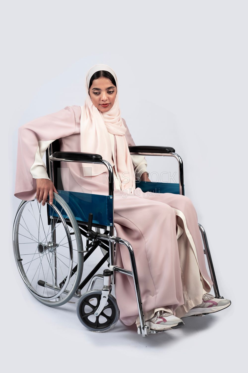 Girl sitting in wheelchair