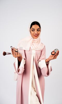 Saudi Gulf girl putting on makeup