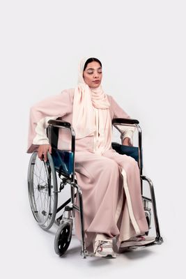Girl sitting in wheelchair