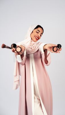 Saudi Gulf girl putting on makeup