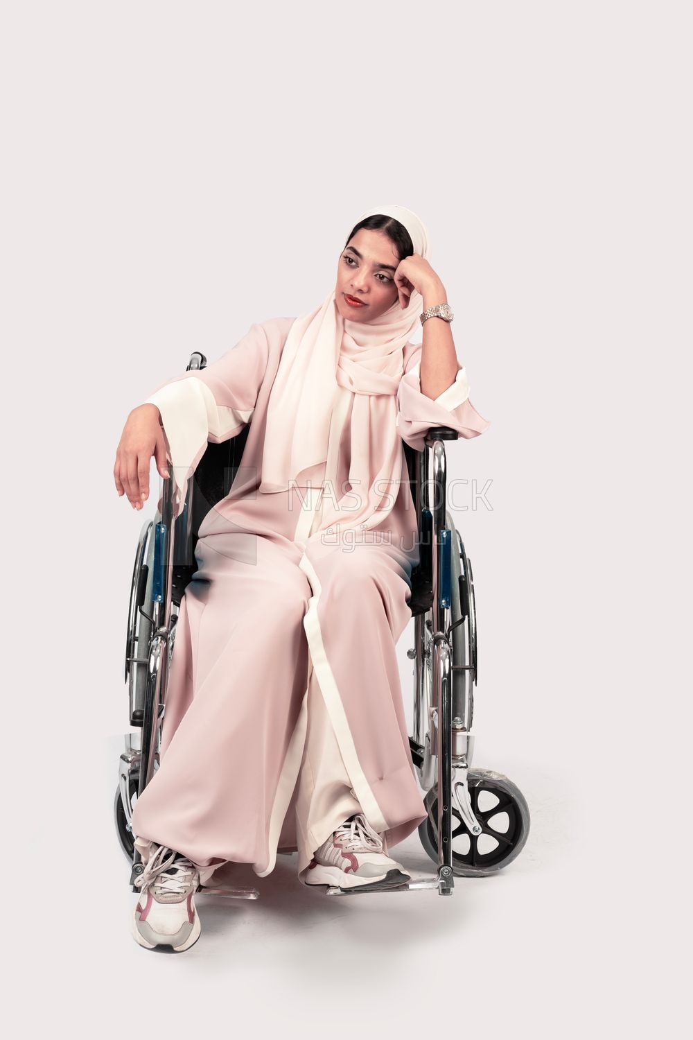 Girl sitting in wheelchair