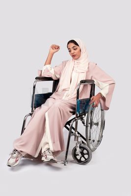 Girl sitting in wheelchair