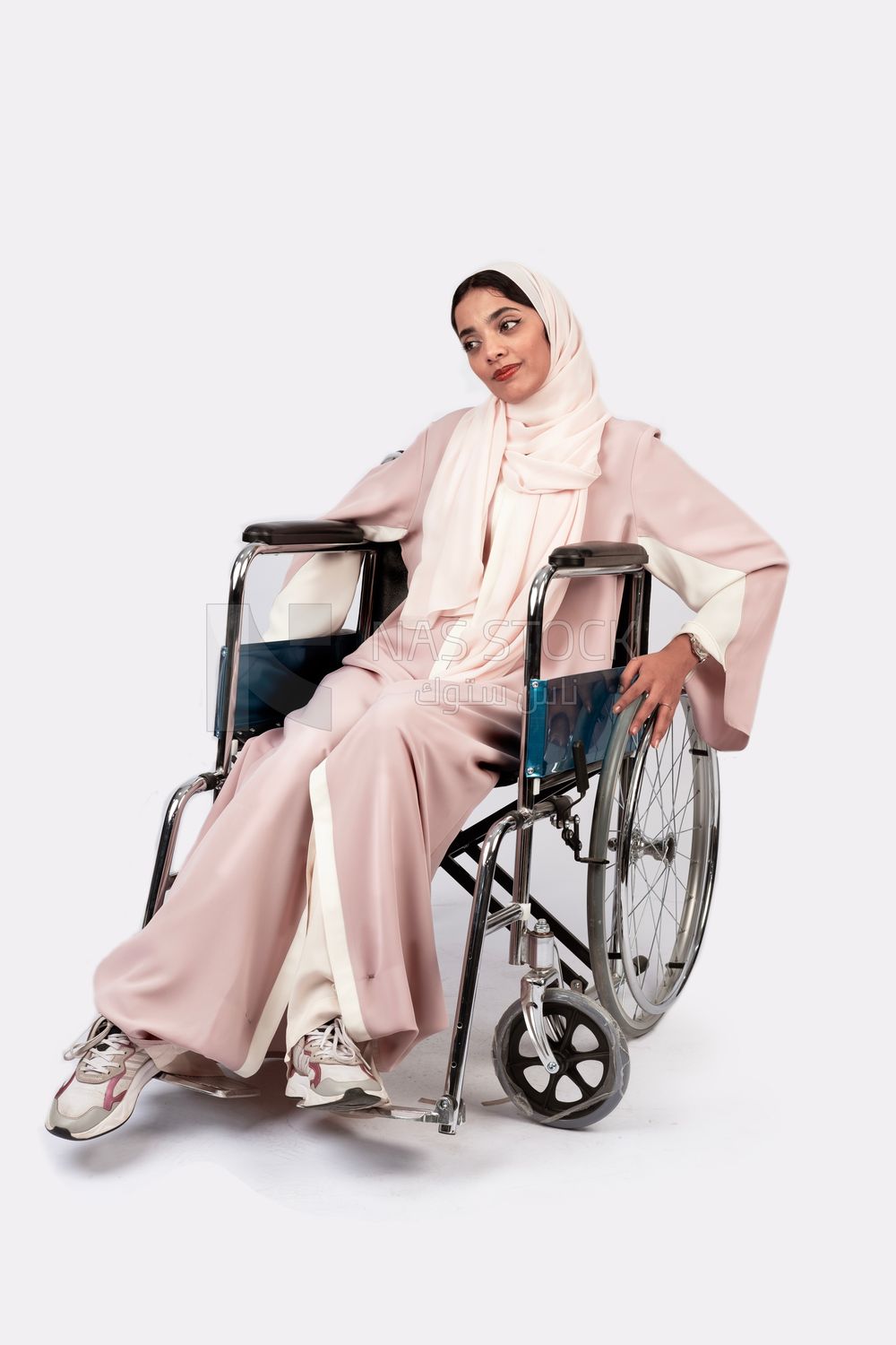 Girl sitting in wheelchair